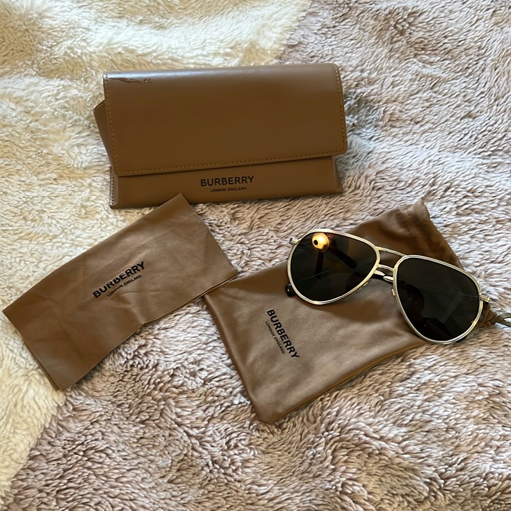 Burberry Not a single scratch. I wore these once. Mint conidtion.